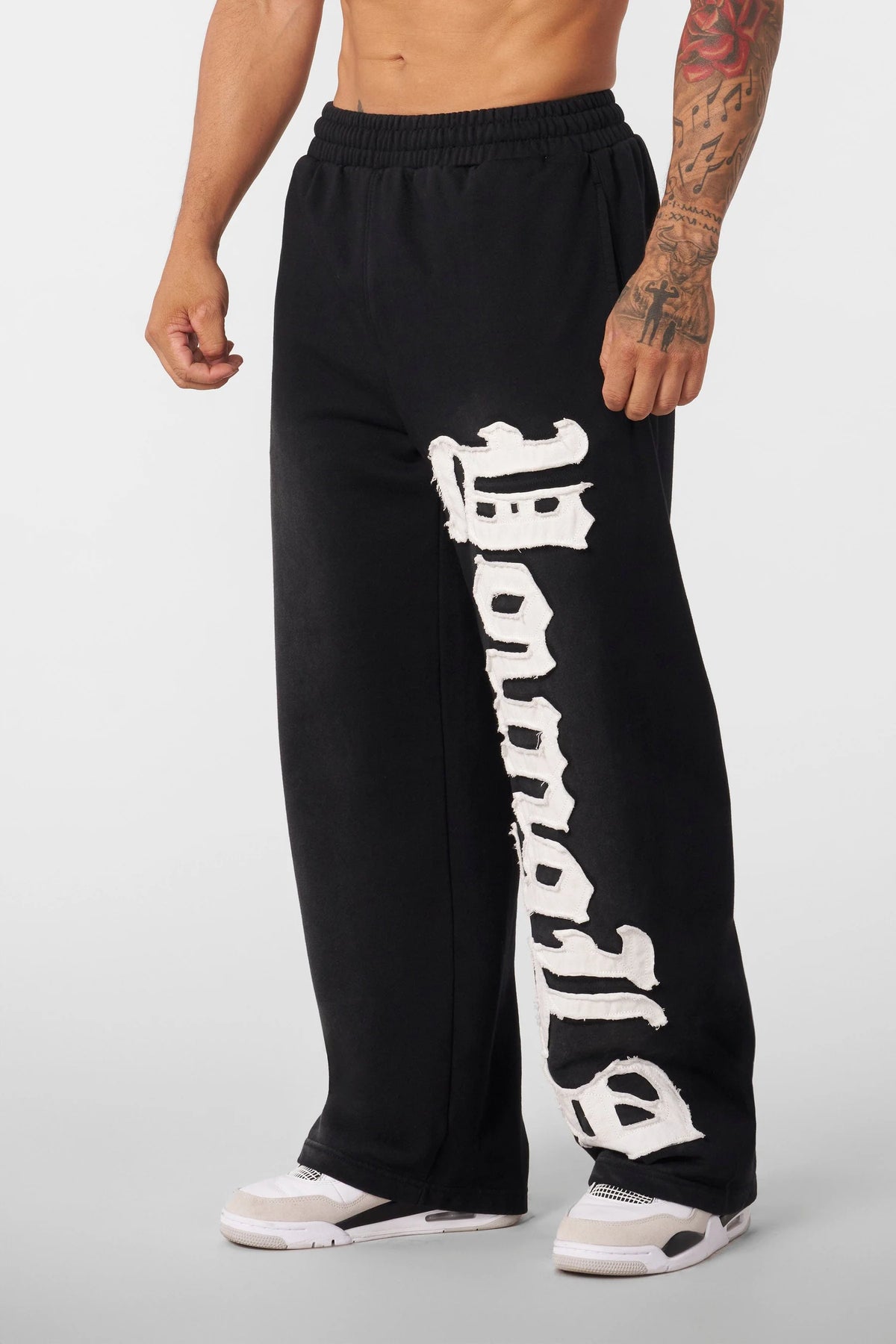 YOUNGLA PATCHED SWEATPANTS