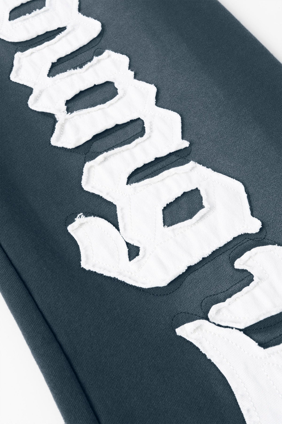YOUNGLA PATCHED SWEATPANTS